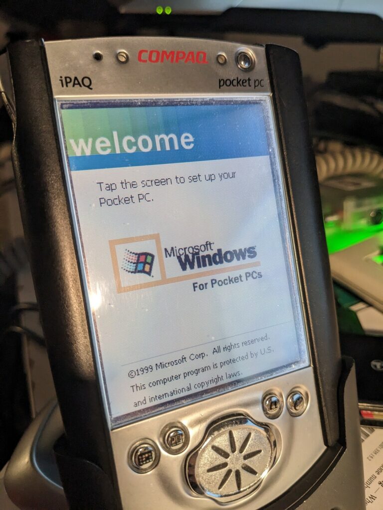 Compaq iPAQ Microsoft Windows for pocket PCs welcome screen 