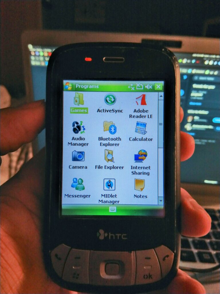HTC P4350, small black phone/pda showing the windows Mobile menu