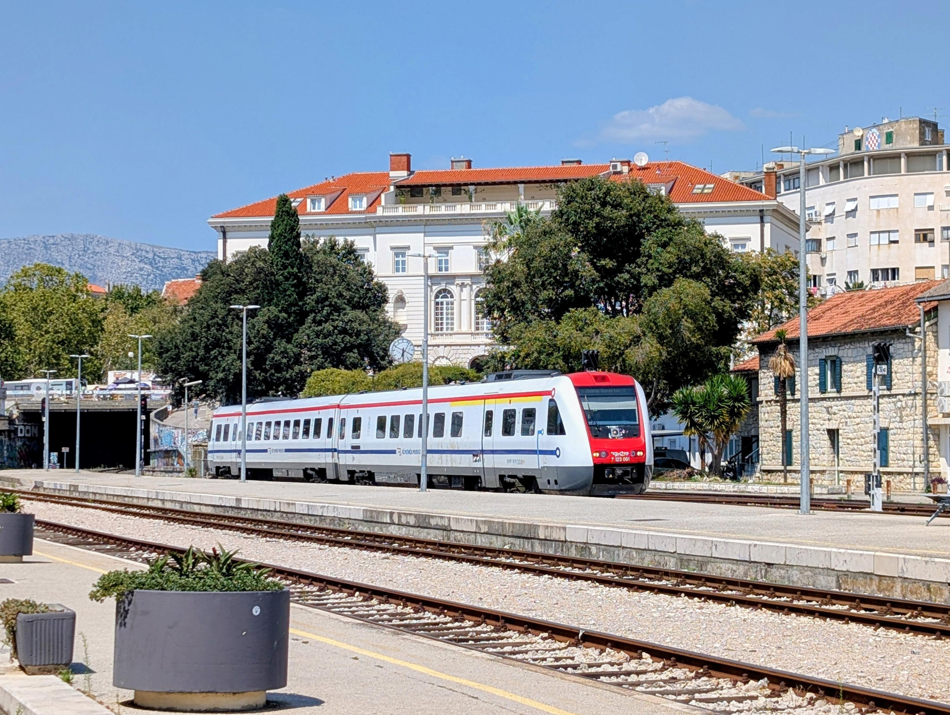 A short DMU train at a coastal station